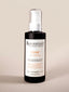 A bottle of Rawceuticals CLEAN organic cleansing oil for the face, suitable for all skin types. The oil is designed to remove makeup and dirt, while protecting the skin against environmental influences.